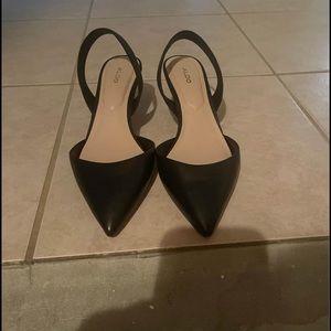 Pointed black kitten heels